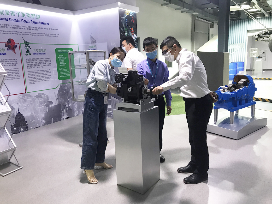 强企联合 司能与雅富顿开展交流合作